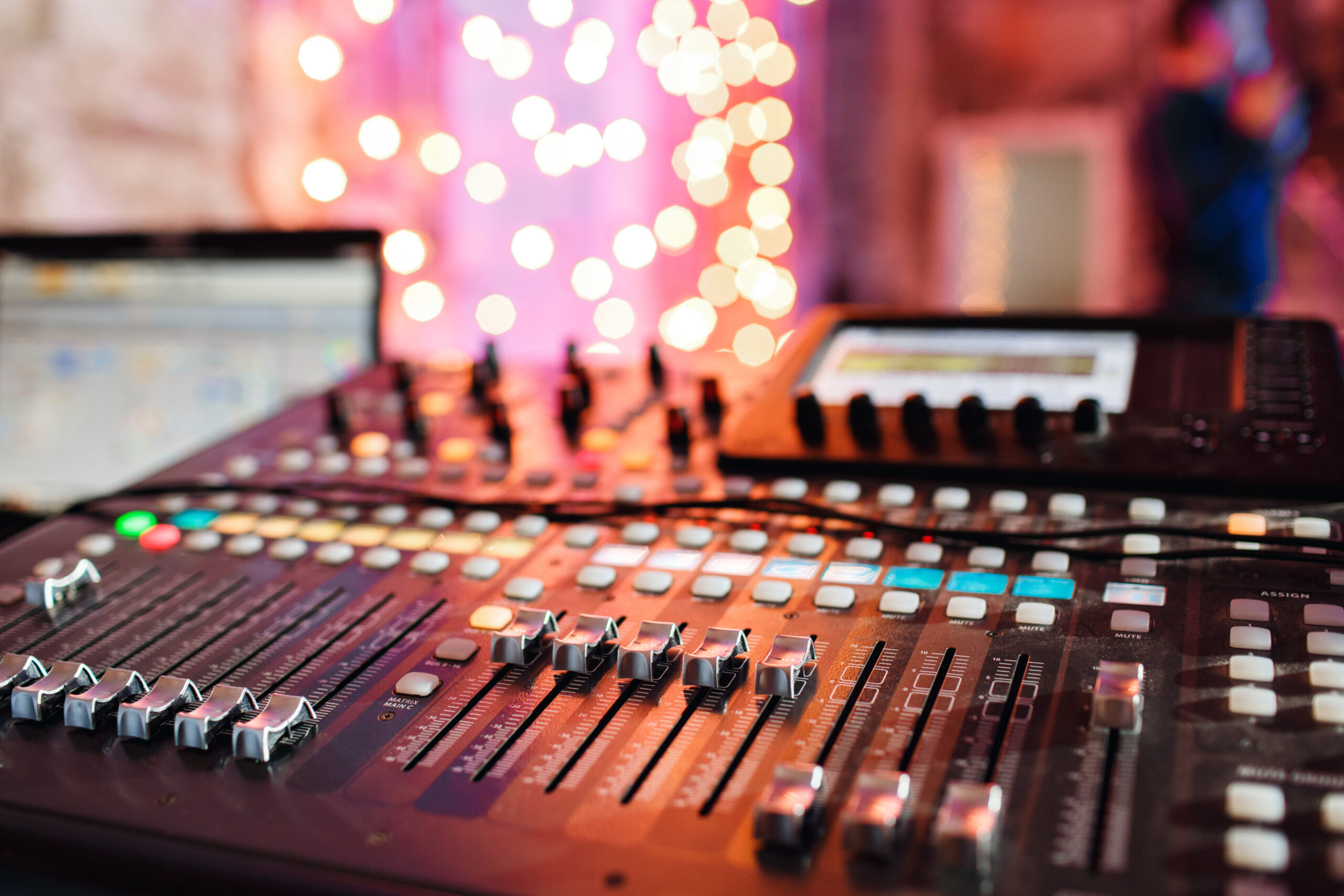od adjusters and red buttons of a mixing console it is used for audio signals modifications to achieve the desired output applied in recording studios, broadcasting, television